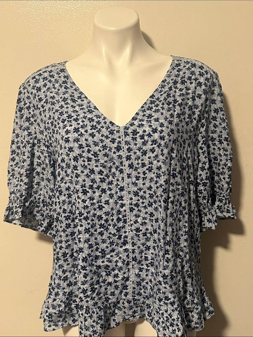 Light Blue Floral V-Neck Blouse with Ruffled Hem